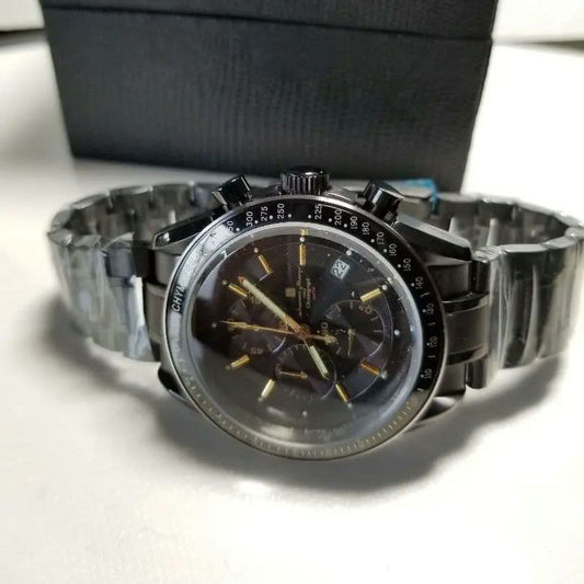 Full black, production model with central chronograph function. #QY3O2T