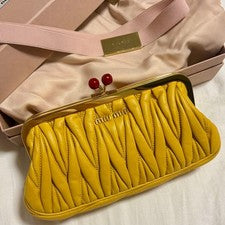 Miu Miu Matelassé Clutch Bag, Yellow #QYE6RT