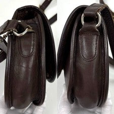 Old Coach shoulder bag, turnlock closure, dark brown. #QY7IRK