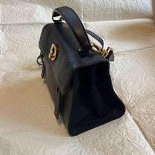 Pre-Owned only once. Saint Laurent black leather handbag with gold hardware. #QY38J0
