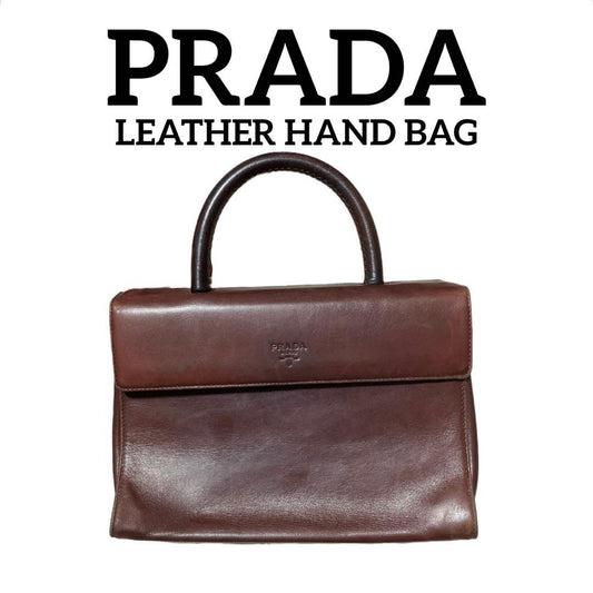 Prada top handle handbag in all-leather nappa leather #PG74M9