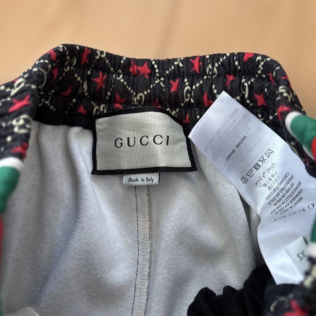 GUCCI jogger pants with star print and logo #QYDI8H