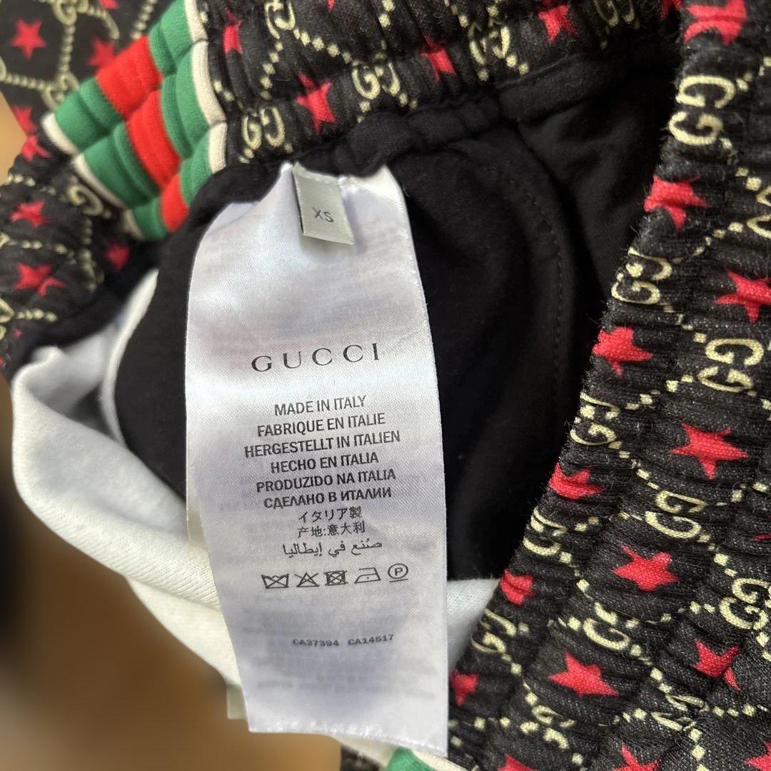 GUCCI jogger pants with star print and logo #QYDI8H