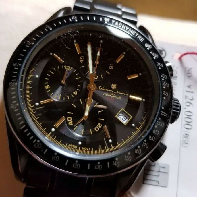 Full black, production model with central chronograph function. #QY3O2T