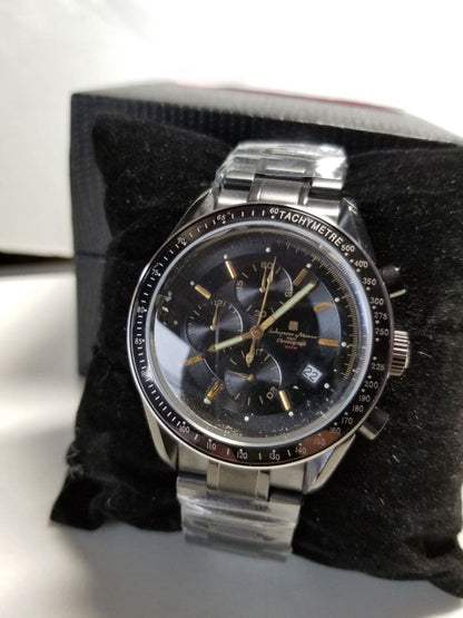 Full black, production model with central chronograph function. #QY3O2T