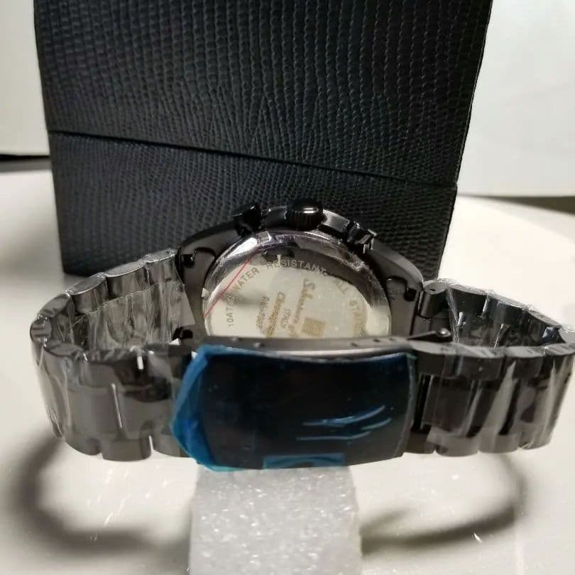 Full black, production model with central chronograph function. #QY3O2T