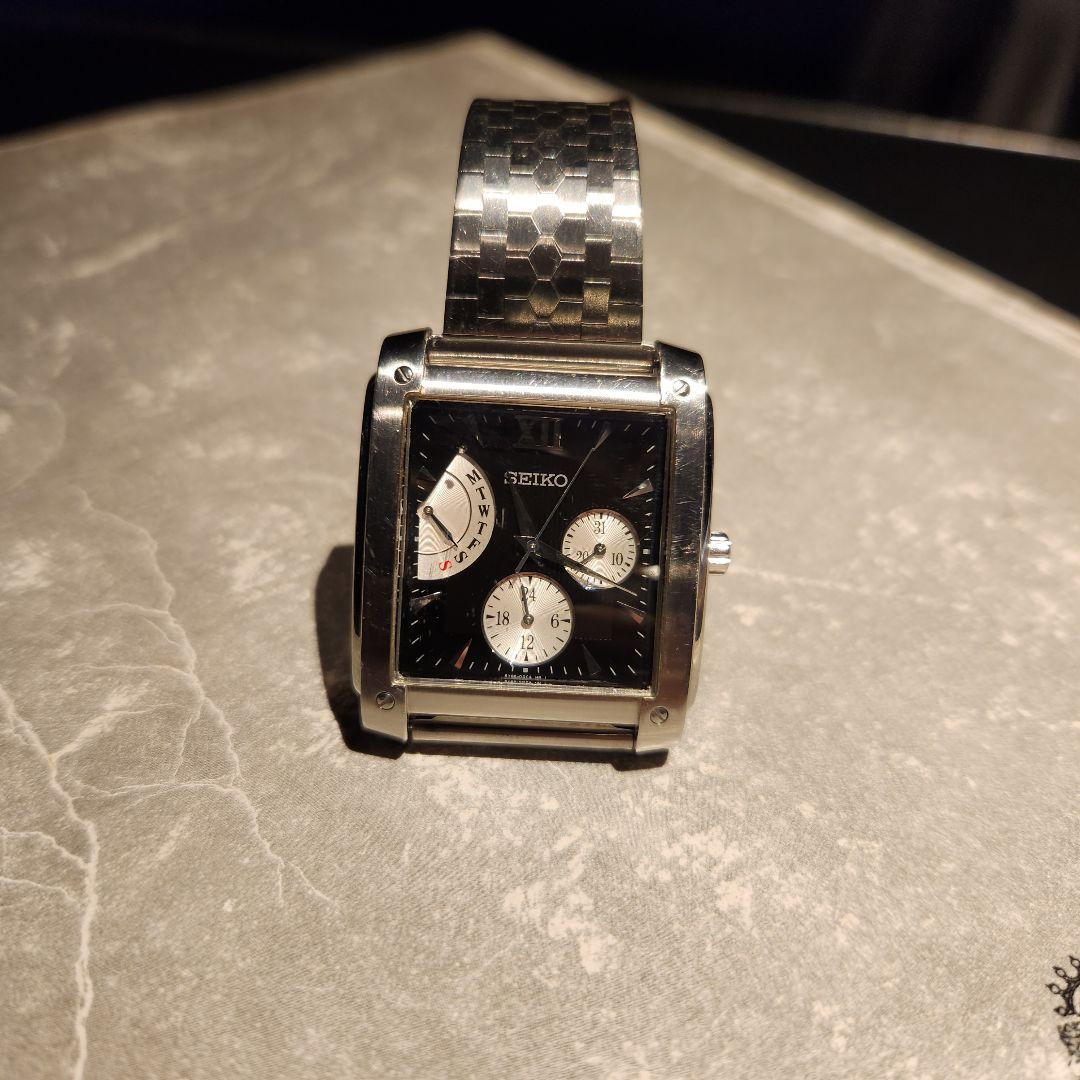 SEIKO model black face quartz analog wristwatch #QYC8MD