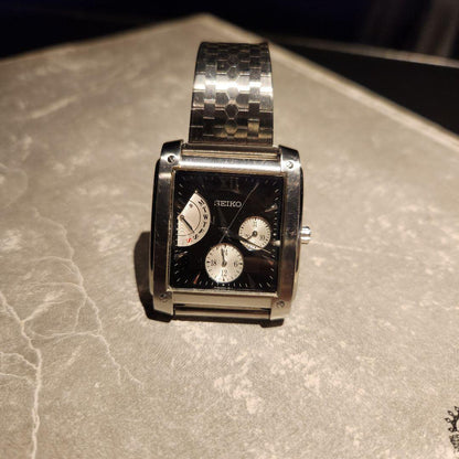 SEIKO model black face quartz analog wristwatch #QYC8MD
