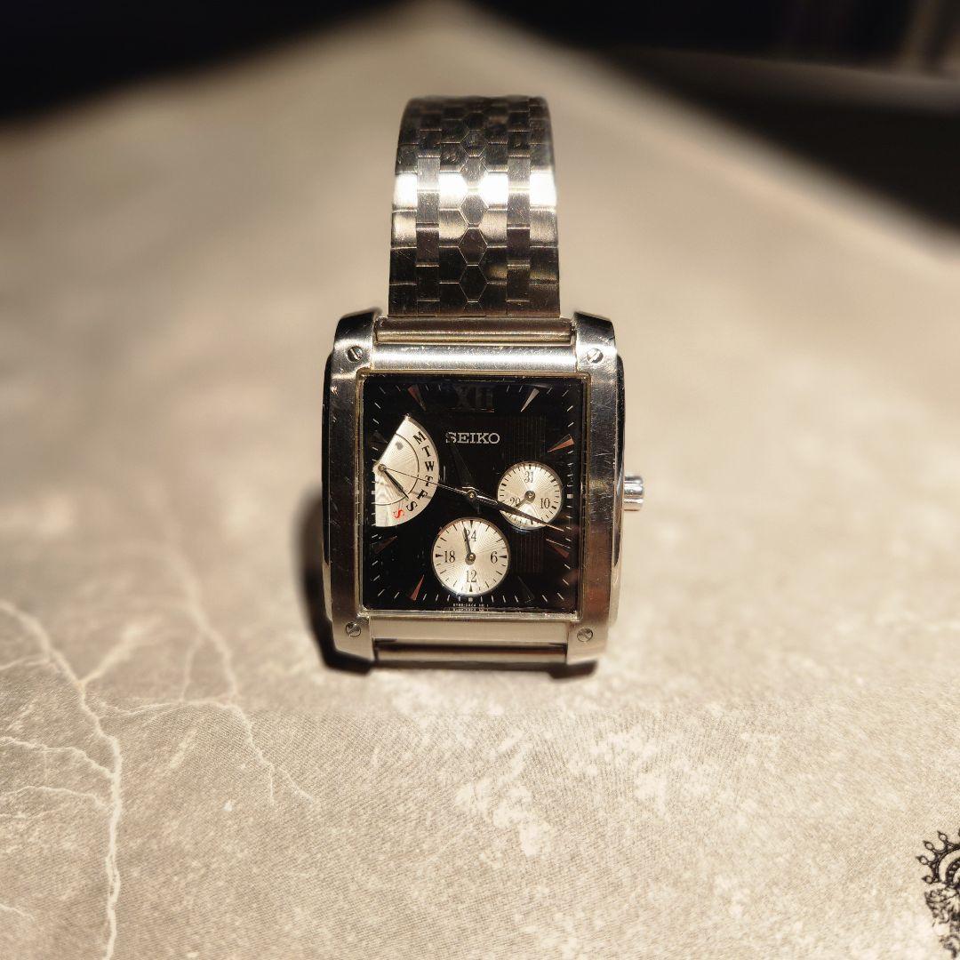 SEIKO model black face quartz analog wristwatch #QYC8MD