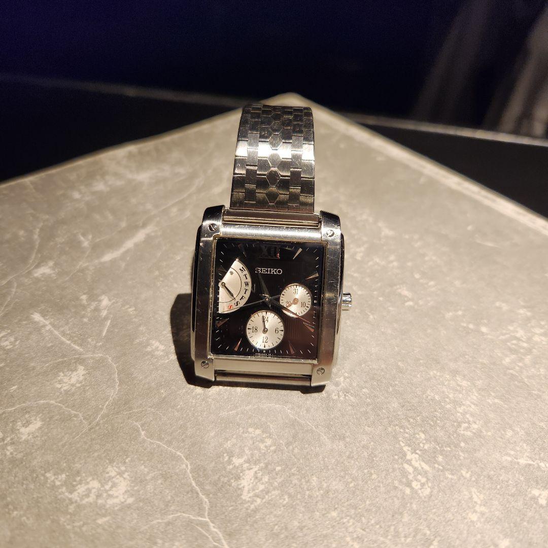 SEIKO model black face quartz analog wristwatch #QYC8MD