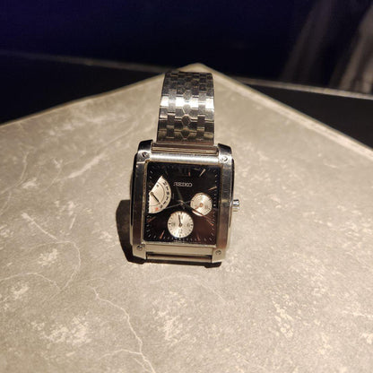 SEIKO model black face quartz analog wristwatch #QYC8MD