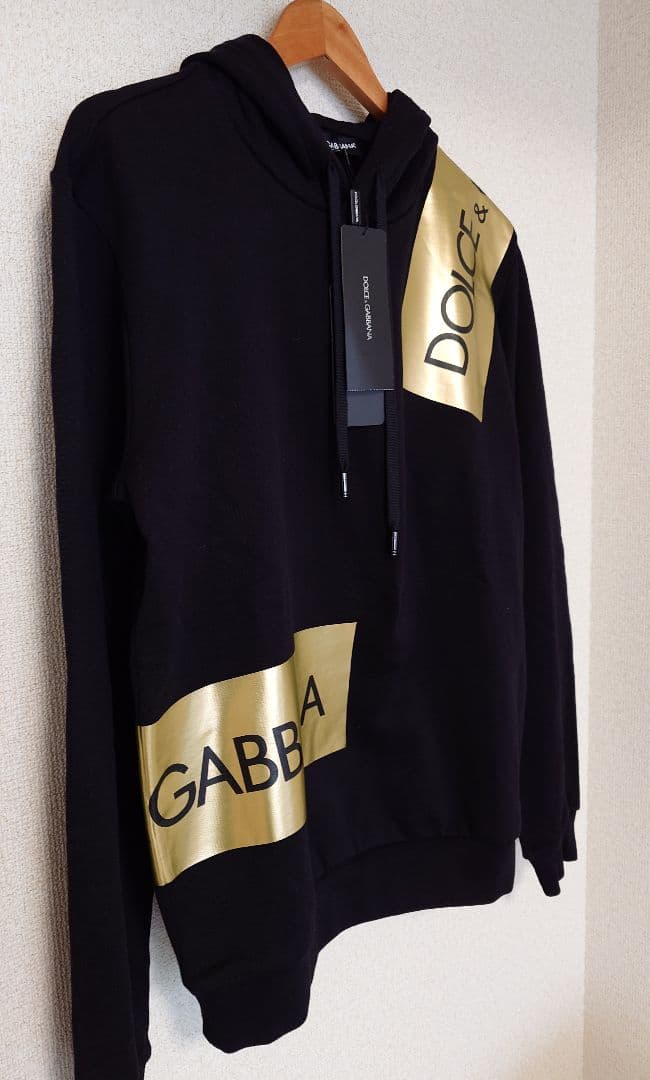 Approximately 9 tags attached Dolce & Gabbana Gold Box Logo Print Hoodie #QY1Q4T