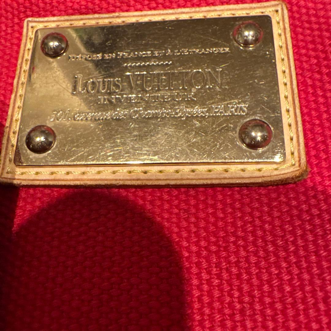 A4 size LOUIS VUITTON Antigua handbag, leather and canvas. #QYEUSJ