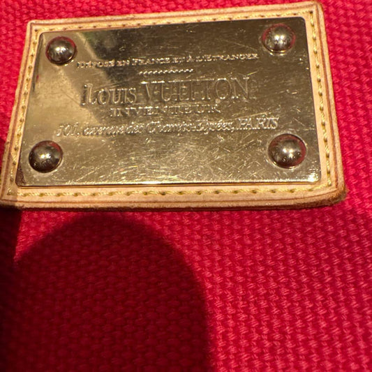 A4 size LOUIS VUITTON Antigua handbag, leather and canvas. #QYEUSJ