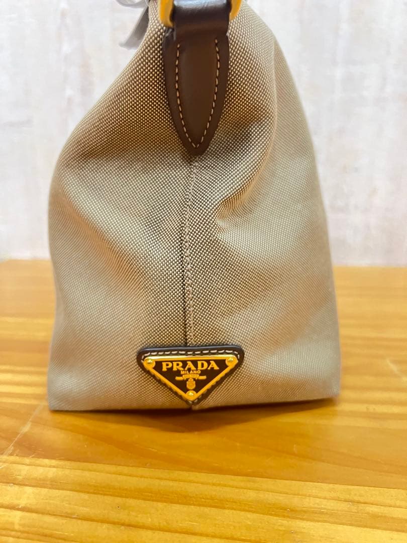 Prada nylon handbag, top, beige. #QYEUPB