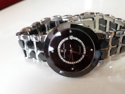 Top material: Sapphire, ceramic, and diamond with certificate of authent #PFGJ4C