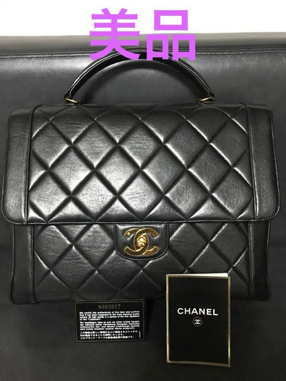 CHANEL Matelasse Coco Mark Quilted Lambskin Handbag Black 31x25x12cm #QYA35A