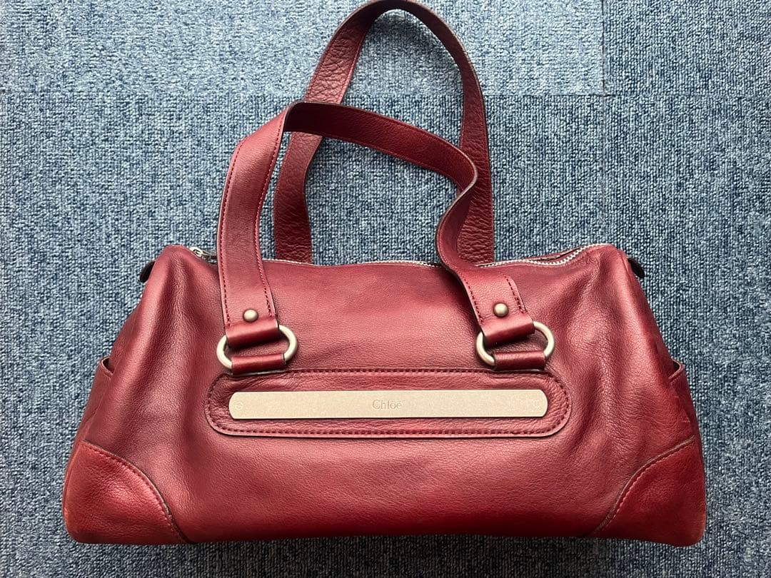 Chloe handbag, red/wine leather. #QYKDO0