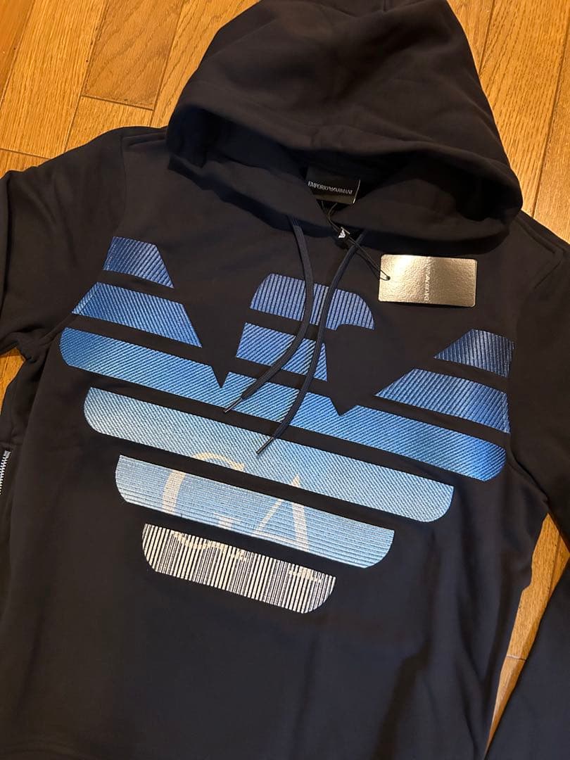 Tagged Emporio Armani hoodie in navy #QYA2RI