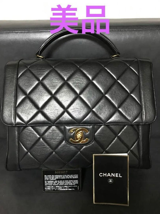 CHANEL Matelasse Coco Mark Quilted Lambskin Handbag Black 31x25x12cm #QYA35A