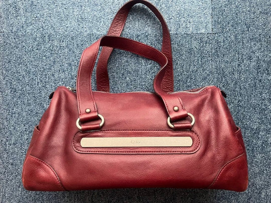 Chloe handbag, red/wine leather. #QYKDO0