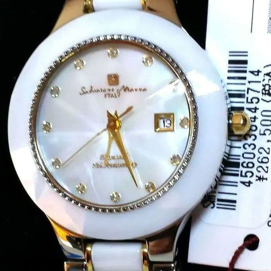 Highly impressive white shell and 12 diamonds included. #QY7QKE
