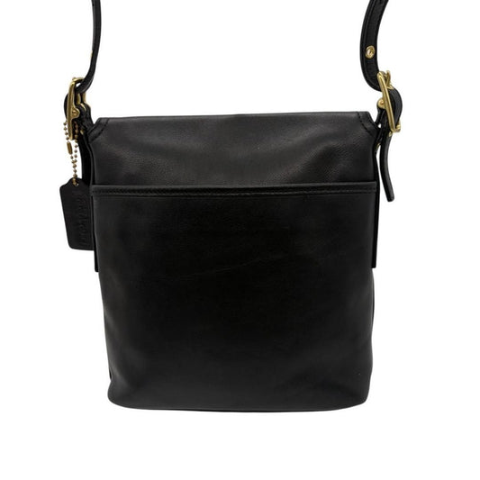Classic Coach shoulder bag, black glovetanned leather. #QYEL2Y