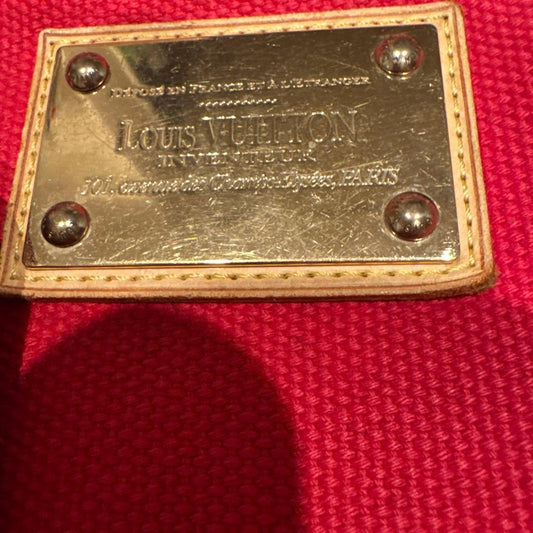 A4 size LOUIS VUITTON Antigua handbag, leather and canvas. #QYEUSJ