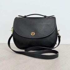 Old Coach shoulder bag, turn-lock closure, Daruma design, black. #QY55QB