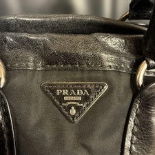 PRADA handbag, black nylon and leather. #QY73AJ
