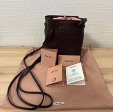 Miu Miu Nappa leather mini bag drawstring type briarwood