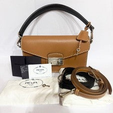 PRADA handbag, clochette style, with key and sound lock. #QY9P6R