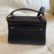 Pre-Owned only once. Saint Laurent black leather handbag with gold hardware. #QY38J0
