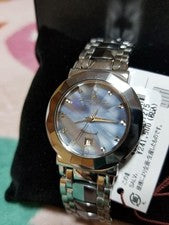 An elegant quartz wristwatch with a mother-of-pearl dial and stone indic #QY7IUQ