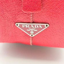 Prada canvas handbag with red leather trim, Boston bag in beige. #QY6H8A