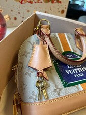 LOUIS VUITTON Alma Gold Leather Handbag #QY73Q1