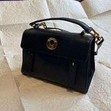 Pre-Owned only once. Saint Laurent black leather handbag with gold hardware. #QY38J0