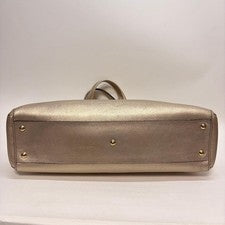 Cartier Marcello handbag, gold and bronze. #QYC0HK