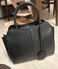 TOD'S SELLA handbag, black, with ball-shaped charm. #QYDQON