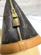 LOUIS VUITTON Alma Monogram Canvas Handbag Brown W30cm H24cm Duty Free #QY0WF3
