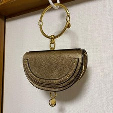Chloe Nile bag, bronze/gold mini bag, accessory. #QY6OQ6