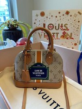 LOUIS VUITTON Alma Gold Leather Handbag #QY73Q1