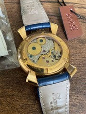 GaGa Milano hand-wound watch with blue leather strap, gold accents, and #QYFNSI