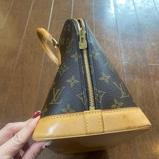 LOUIS VUITTON Alma PM Monogram Canvas Leather Handbag Brown #QYA2O4
