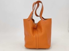HERMES Picotin Lock MM, Taurillon leather, orange tones, silver hardware #QYFHOY