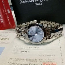 An elegant quartz wristwatch with a mother-of-pearl dial and stone indic #QY7IUQ