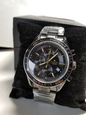 Full black, production model with central chronograph function. #QY3O2T