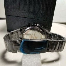 Full black, production model with central chronograph function. #QY3O2T