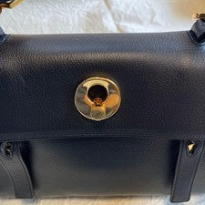 Pre-Owned only once. Saint Laurent black leather handbag with gold hardware. #QY38J0
