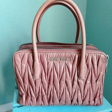 miumiu Matelasse Handbag Can also be Pre-Owned as a shoulder bag.